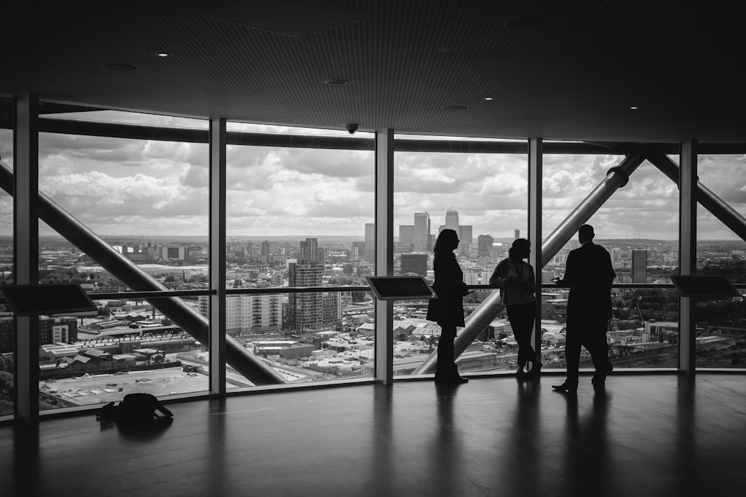 why-choose-us meeting near a transparent glass